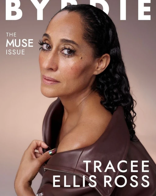 Tracee Ellis Ross on the cover of Byrdie's 'The Muse' issue, wearing a brown leather jacket, captured in a studio with soft lighting.