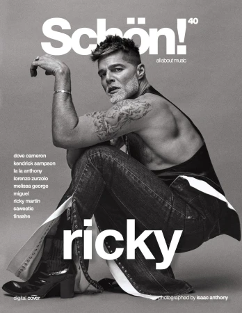 Schön! magazine cover featuring Ricky Martin, posing in a leather top and jeans with leg slits, photographed in a studio setting.