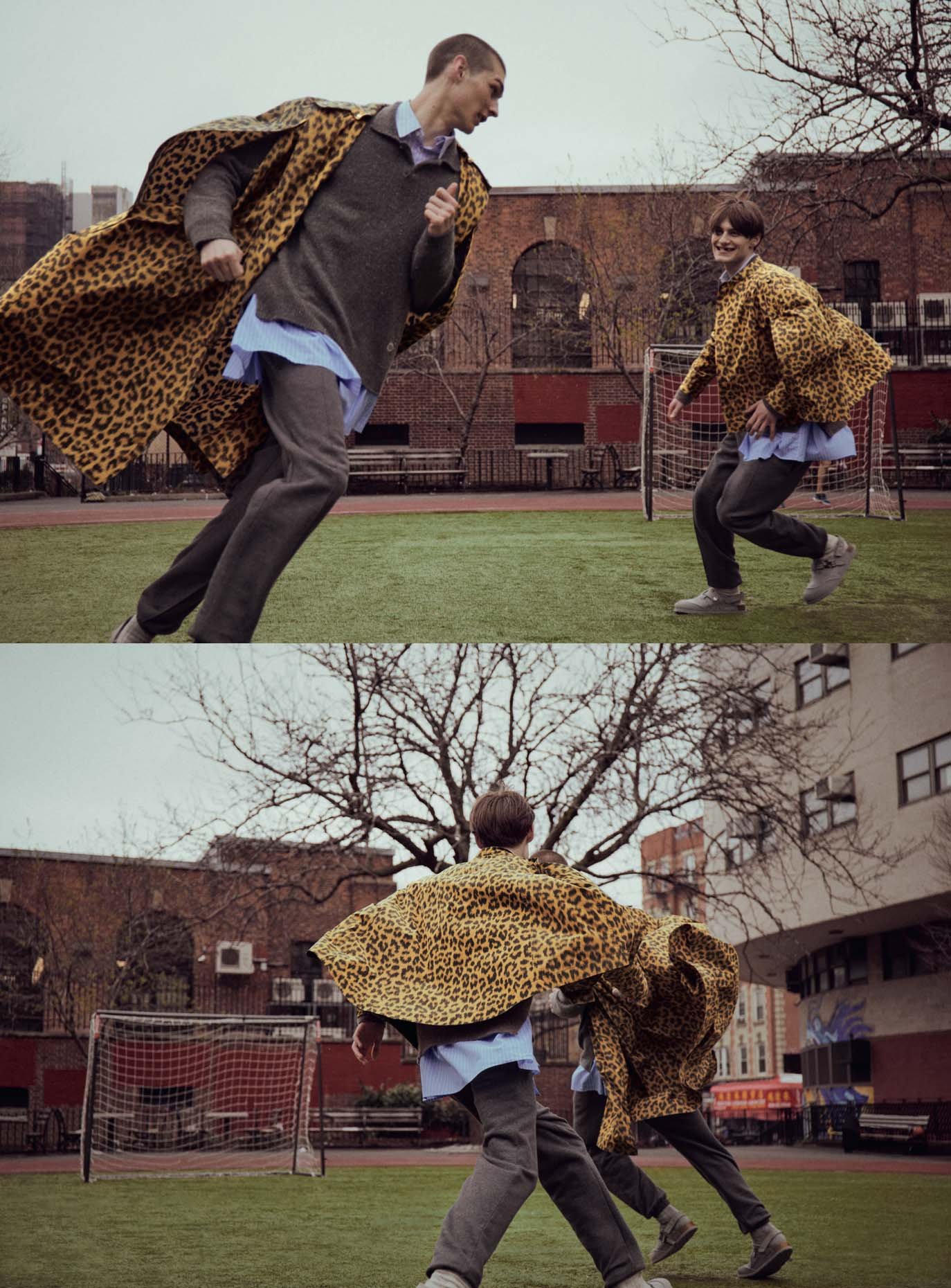 Two adult men in a grass field playing a game; one man runs toward the camera, wearing a leopard-print coat, on an overcast day.