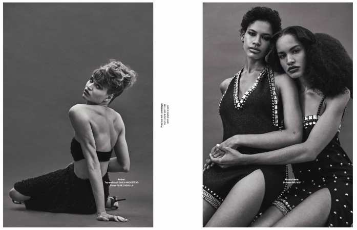 Monochrome studio shot features a seated female model with updo, back facing camera, and two embracing models in embellished dresses.
