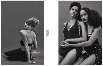 Black and white editorial magazine spread featuring three female models in dark textured dresses against a grey background.