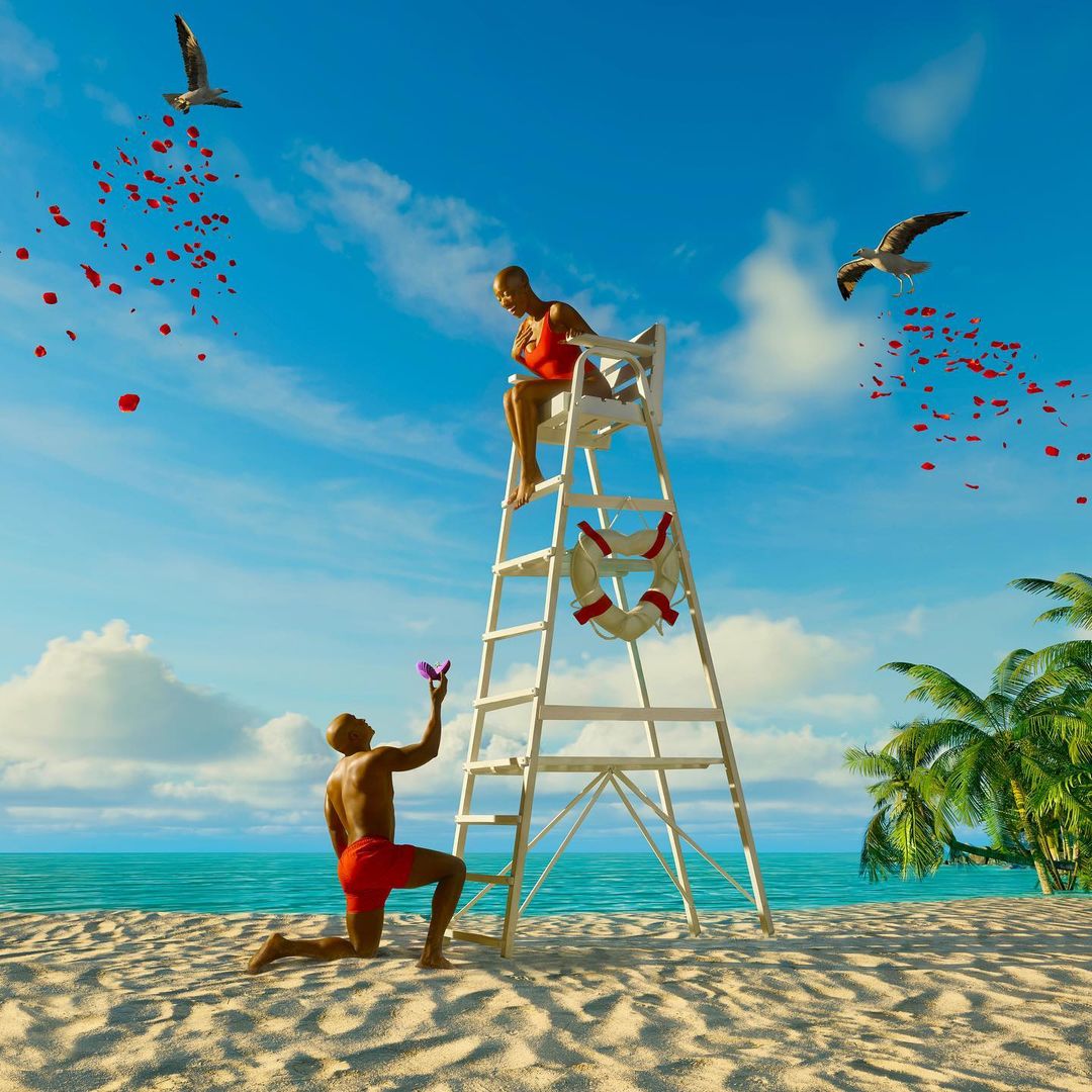 Man proposing with a ring to a woman seated on a lifeguard tower on a sandy beach with palm trees, blue sky, and seagulls.