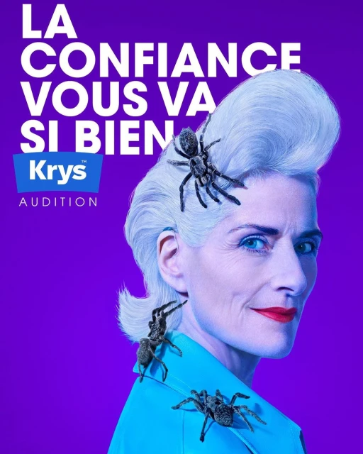 Woman with spiders in hair and on shoulder, purple background, Kry's Audition advertisement.