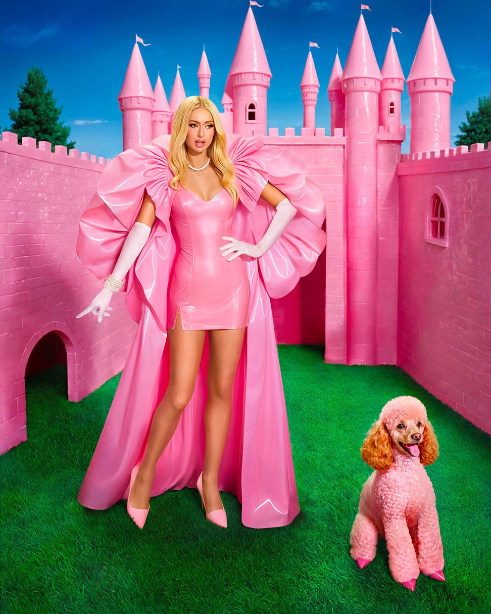 Woman in pink dress with poodle in fantasy setting featuring a pink castle and green field under a bright blue sky.