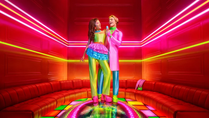 A duet of performers sings into a microphone on a lighted disco floor in a room with neon lights and a long red leather couch.