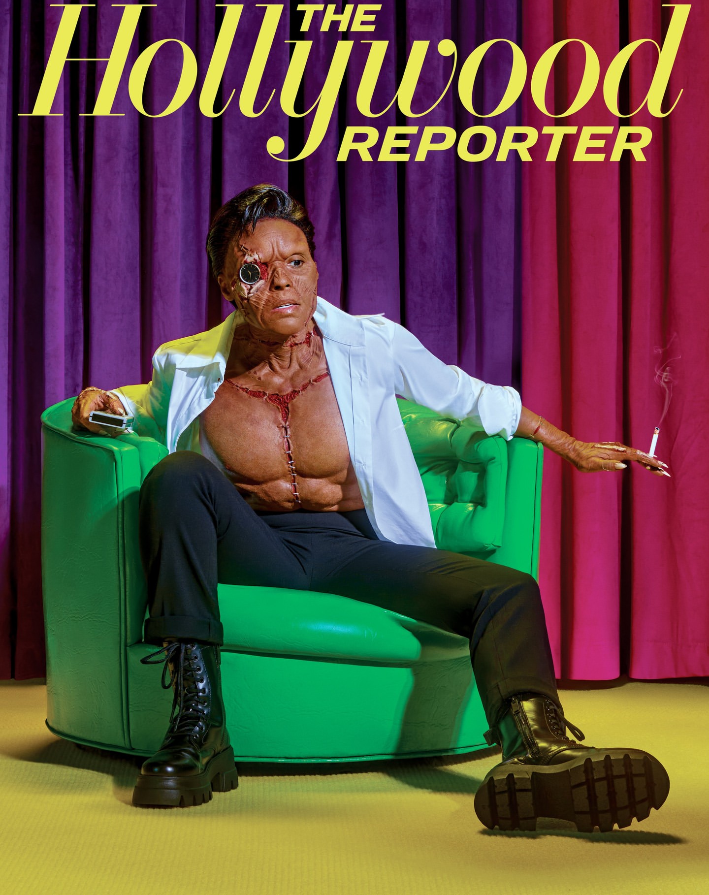 Magazine cover featuring an adult male in costume sitting in a green chair, holding a cigarette, with 'The Hollywood Reporter' text above.