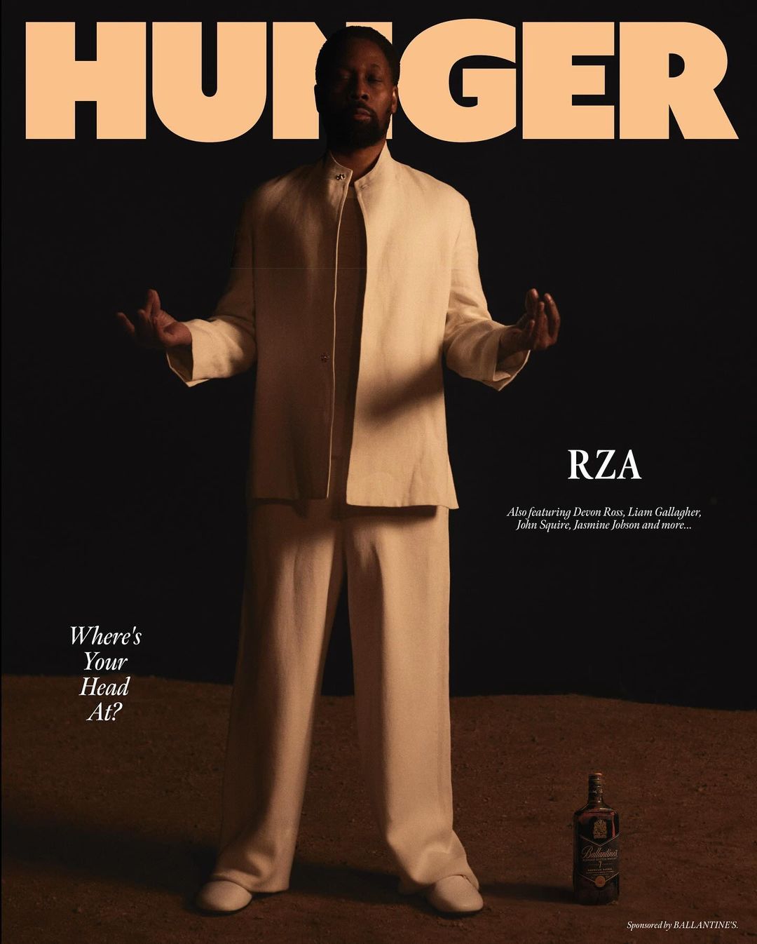 Magazine cover featuring RZA in a cream suit, standing tall with open hands, shadowed backdrop, and 'HUNGER' title above.