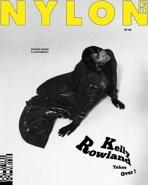 Kelly Rowland on the cover of Nylon France N°44 magazine. The singer wears a black outfit in a studio photo on a white background.