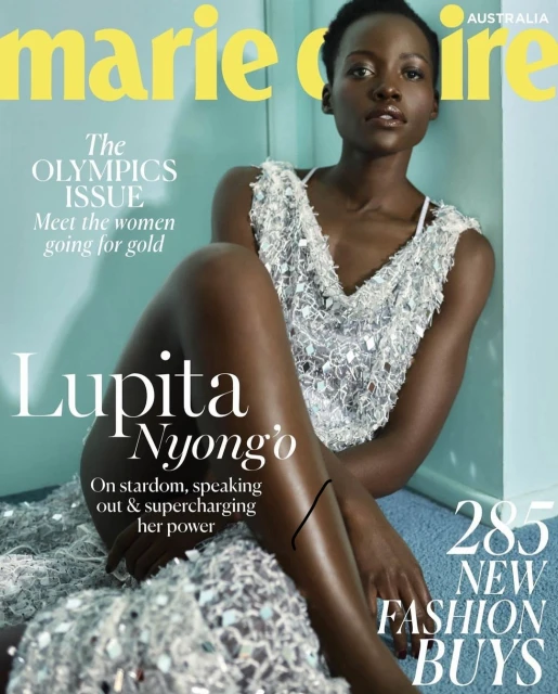 Marie Claire Australia cover featuring Lupita Nyong'o in a shimmering dress, seated against a soft blue backdrop. Fashion and celebrity focus.