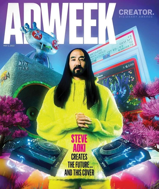Magazine cover featuring Steve Aoki wearing yellow knit sweater, DJ equipment, and anime-style art against purple floral background.