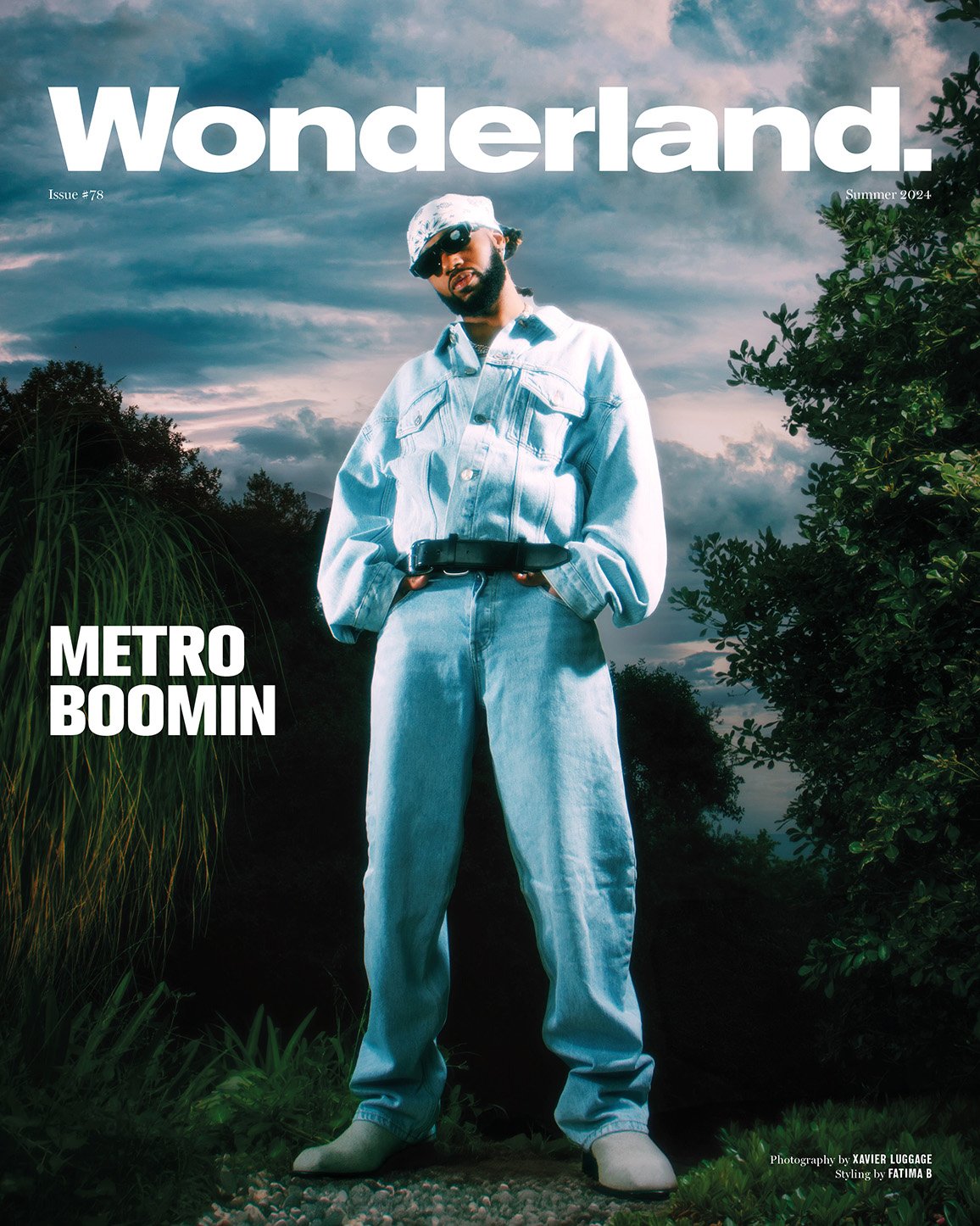 Magazine cover featuring Metro Boomin wearing light blue denim and bandana, with a cloudy sky and green foliage background.