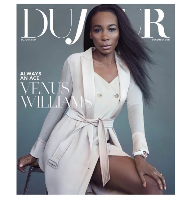 Venus Williams magazine cover. Portrait of a Black woman in beige belted jacket and dress, long dark hair, seated on a stool.