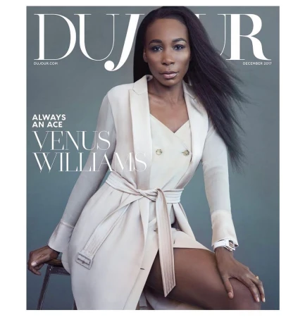 Venus Williams magazine cover. Portrait of a Black woman in beige belted jacket and dress, long dark hair, seated on a stool.