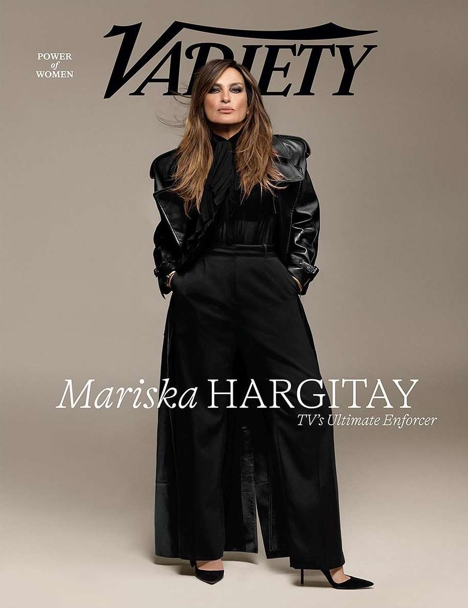 Mariska Hargitay on Variety cover in a black leather jacket, top, and wide-leg pants with black pointed heels in a studio setting.