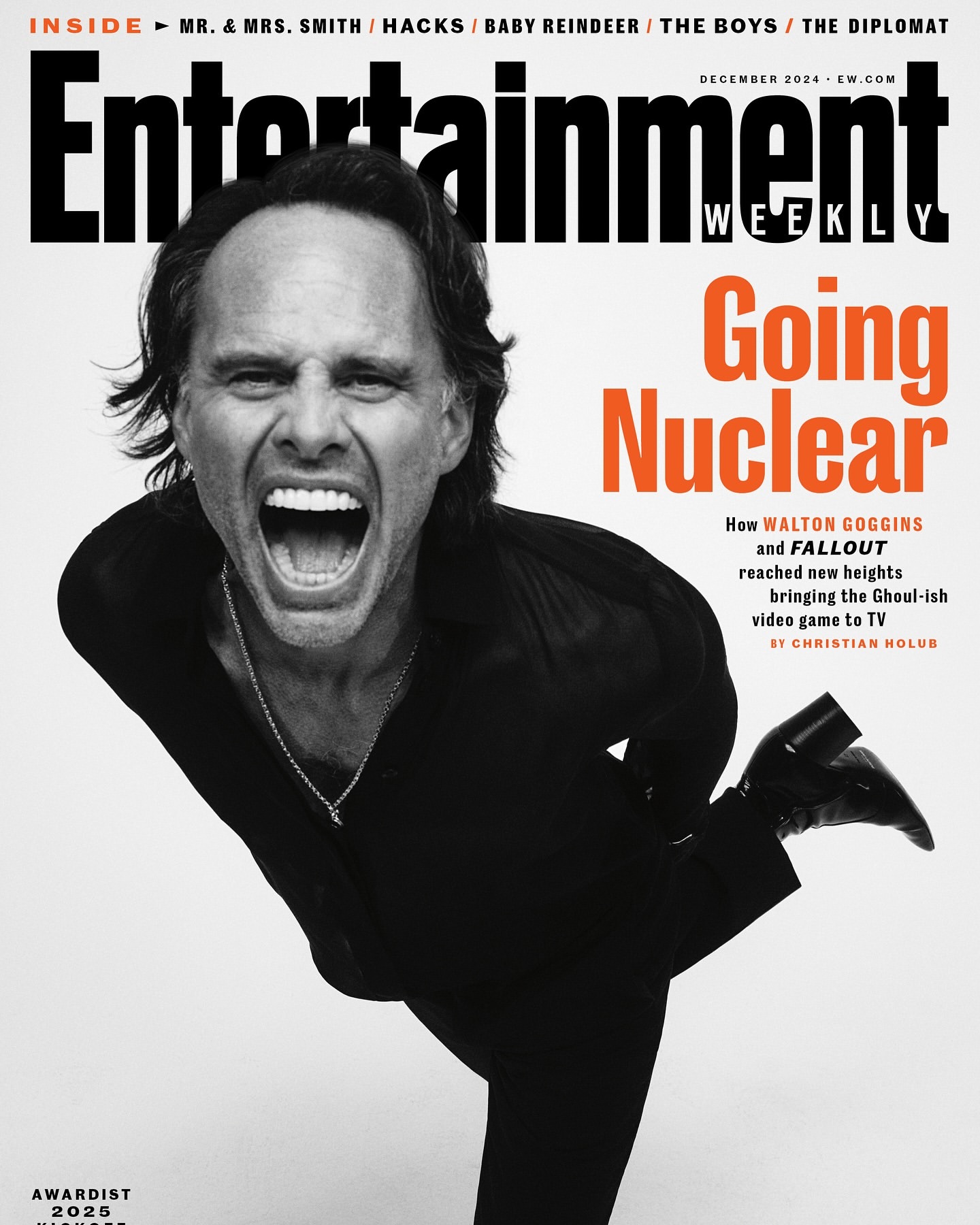 Entertainment Weekly magazine cover featuring actor Walton Goggins, black and white tones with pops of orange for the magazine's title.