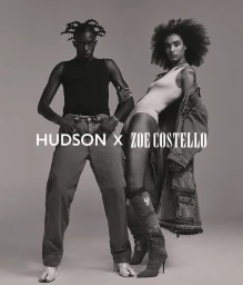 Monochrome fashion editorial portrait of a man and woman posing against a seamless grey background by photographer Jonny Marlow.