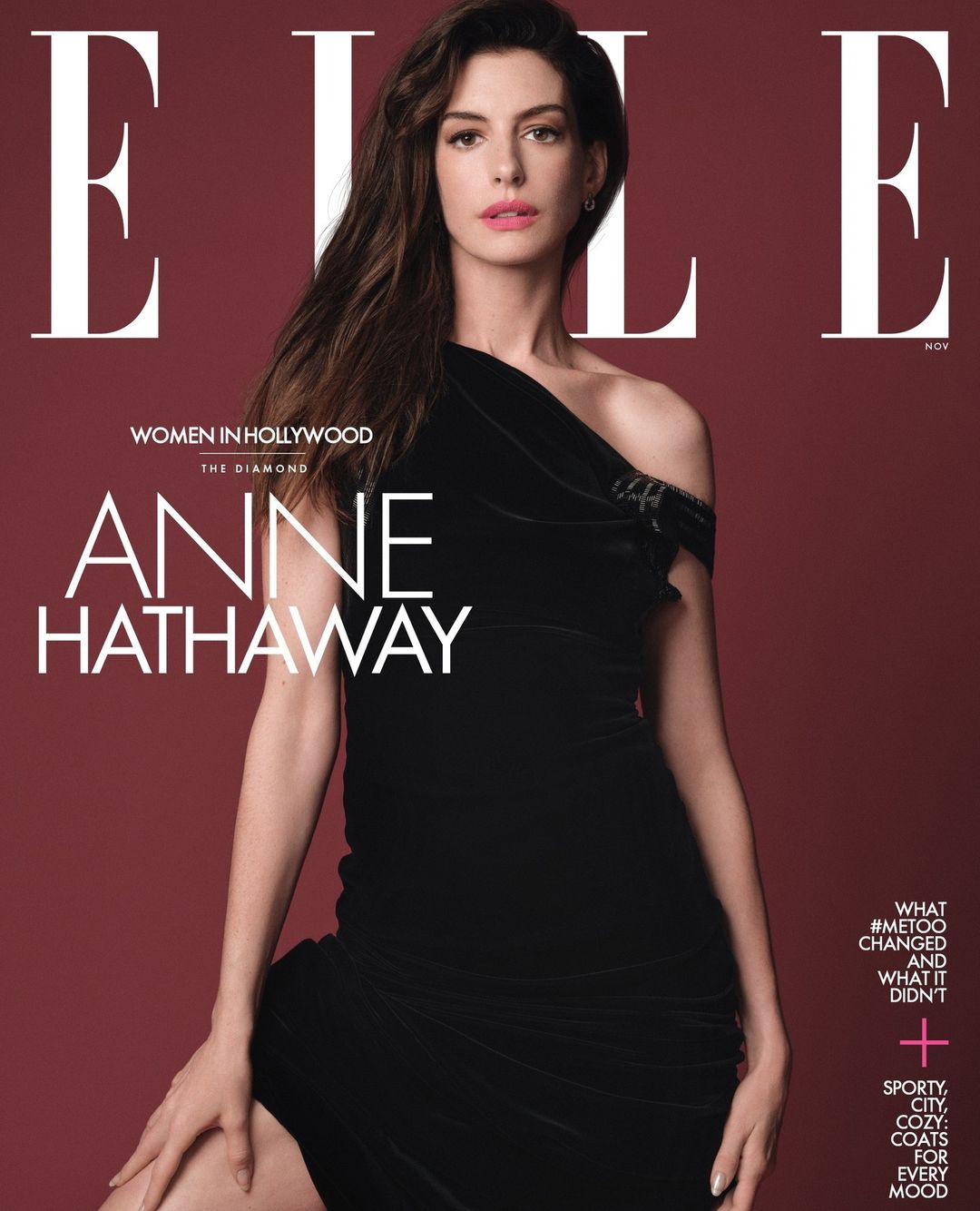 Anne Hathaway poses in a one-shoulder black dress on the cover of Elle magazine. 'Women in Hollywood' issue.