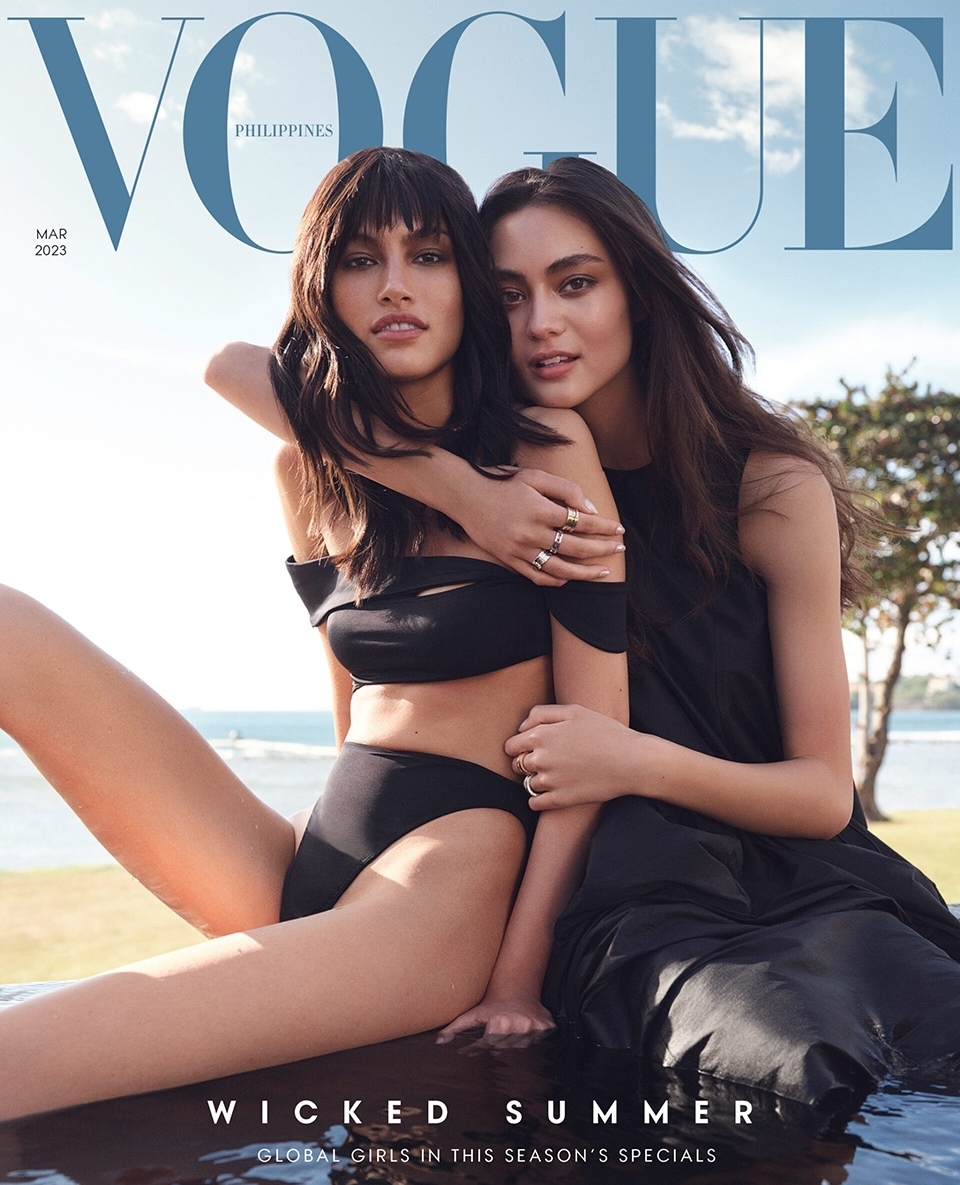 Vogue Philippines magazine cover featuring two women in swimwear and summer dresses, set against an outdoor ocean backdrop.