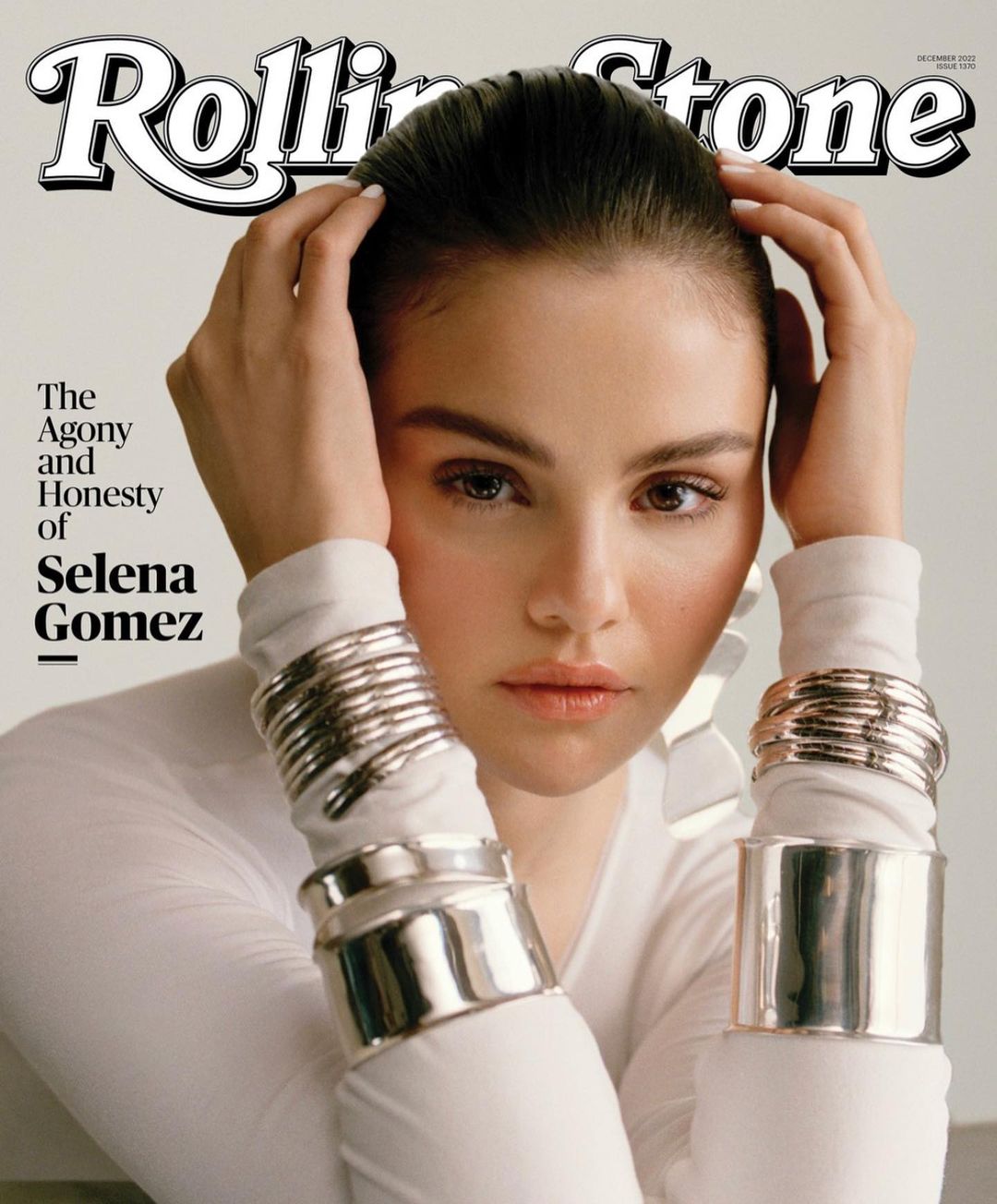 Magazine cover featuring Selena Gomez in a white long-sleeve shirt with large silver cuff bracelets and the Rolling Stone logo above her head.