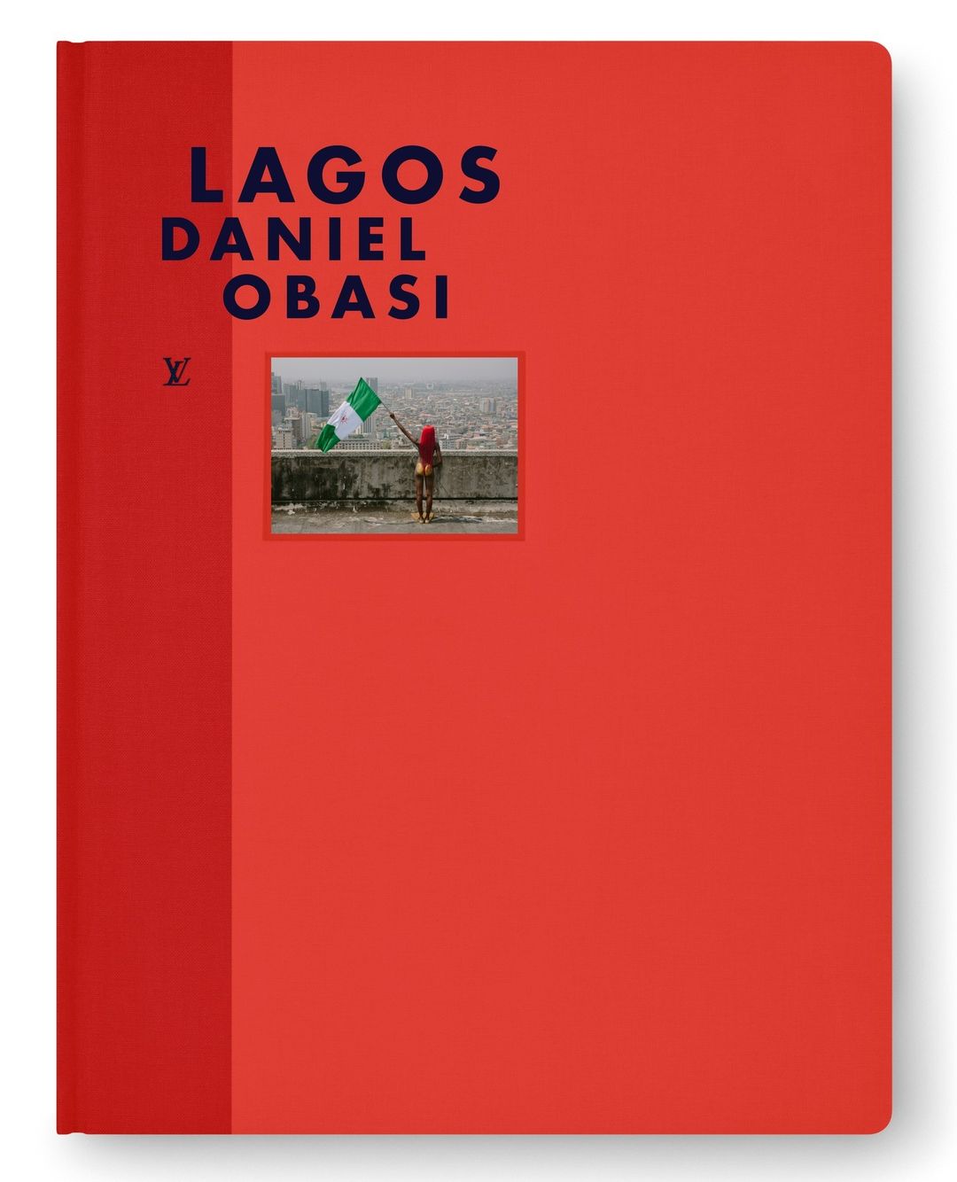 Red hardcover book with dark blue typography reading LAGOS DANIEL OBASI and a small inset photograph on the cover.