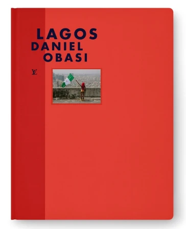 Red hardcover book with dark blue typography reading LAGOS DANIEL OBASI and a small inset photograph on the cover.