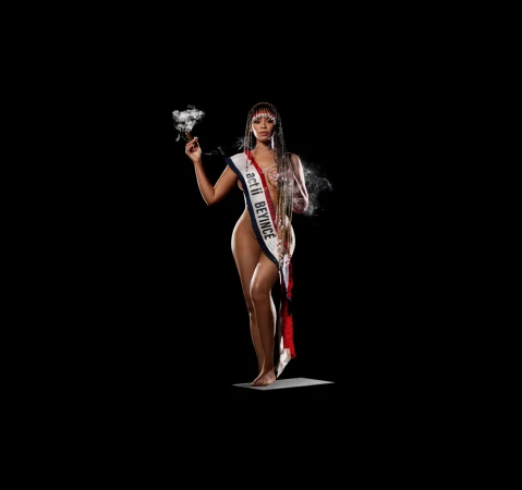 Beyonce wearing a sash reading act ii BEYINCE holding a lit cigar against a black background