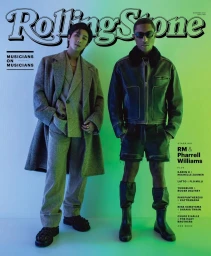 RM of BTS and Pharrell Williams posing on a Rolling Stone magazine cover with green and blue lighting