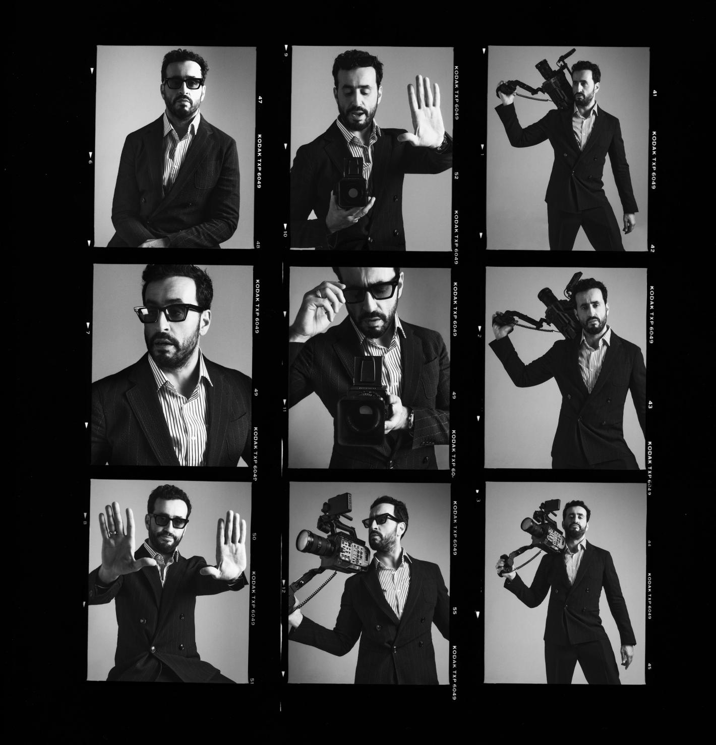 Black and white film strip of a man in a suit with different poses holding cameras in a photo studio, with dark background.