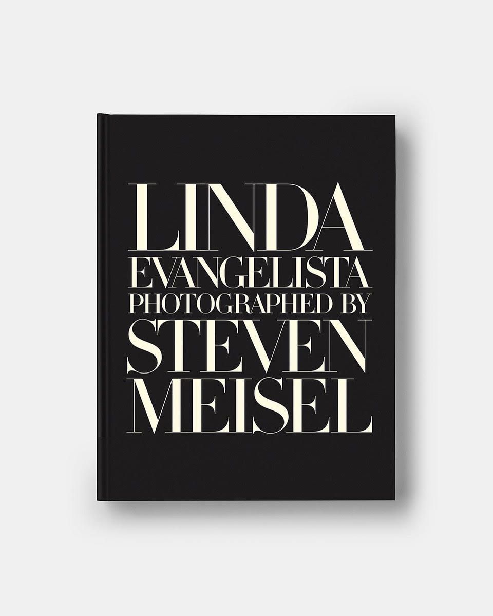 Book cover featuring the title 'Linda Evangelista by Steven Meisel' in bold white letters against a sleek black background.