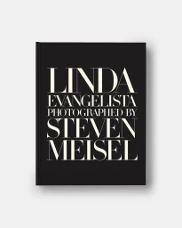 Hardcover book with black cover displaying large white serif typography against a pale grey background