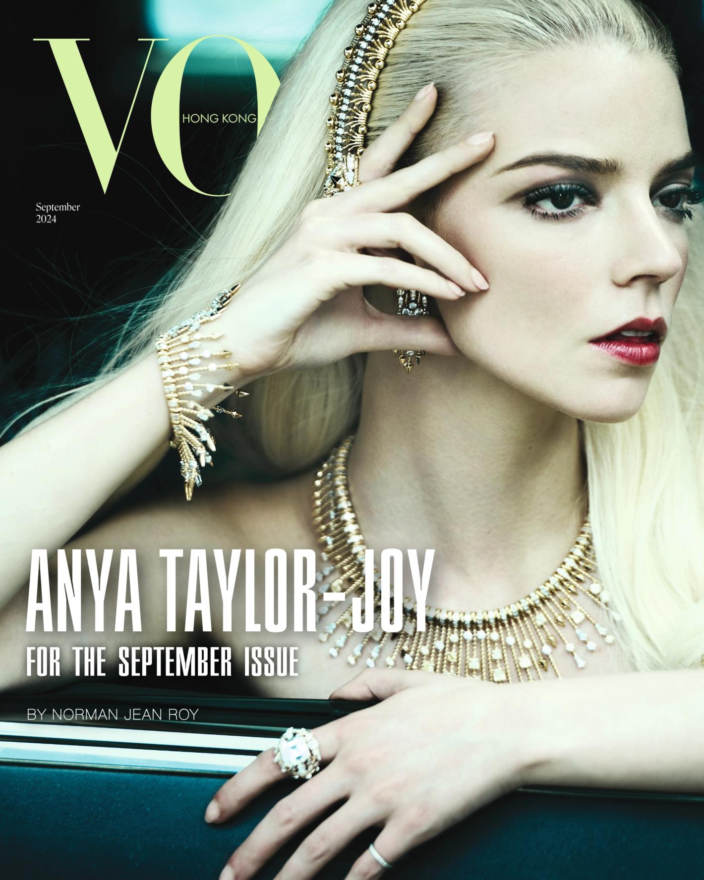 Vogue Hong Kong cover featuring Anya Taylor-Joy with blonde hair, gold jewelry, and red lipstick, in a fashion and beauty editorial style.
