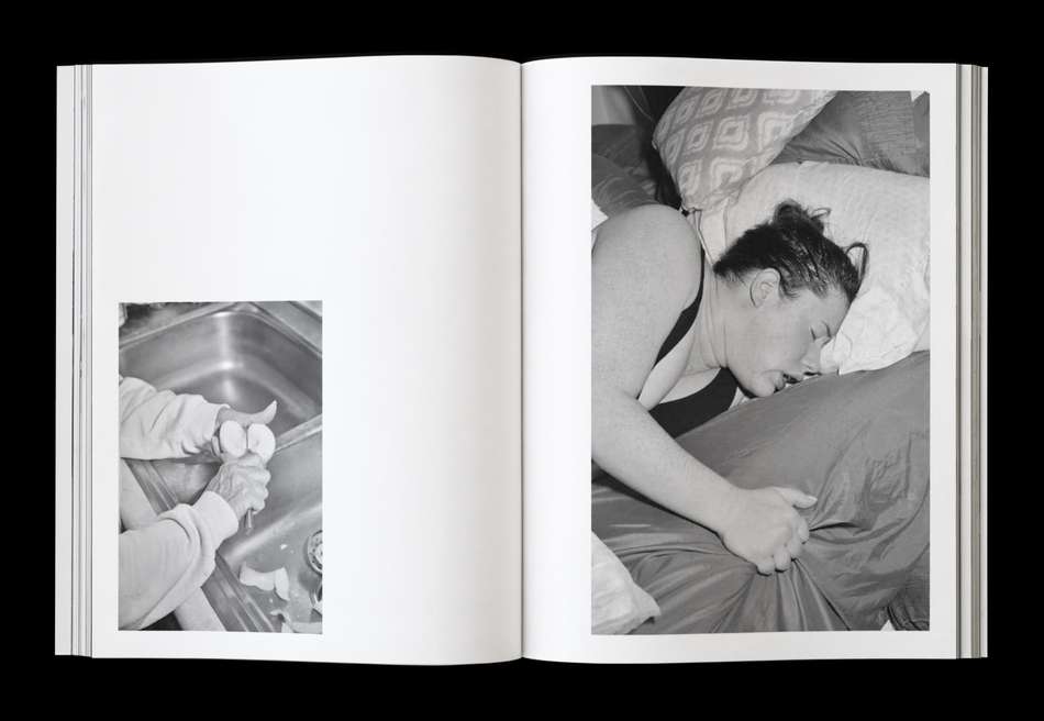 Monochrome photo book spread featuring a person sleeping in bed and another peeling eggs in a sink, creating a juxtaposition of daily life.