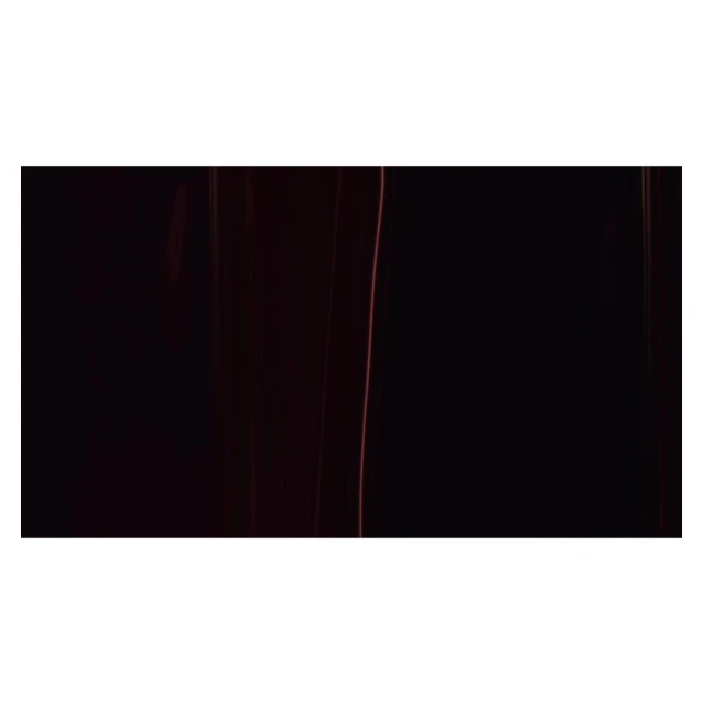 Abstract image with dark gradient background and subtle, blurred line details adding texture and depth to the minimalist composition.