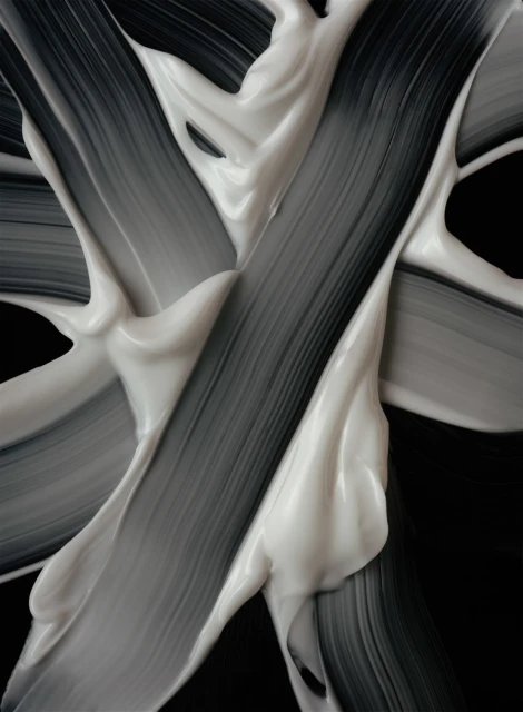 Swirls of thick, light-beige cream texture against a black backdrop, abstract beauty concept, skincare, or cosmetic product shot.