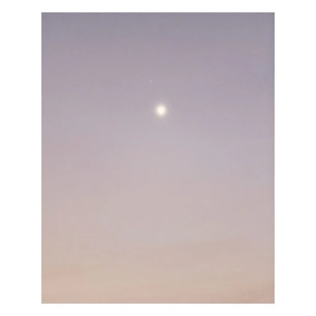 Sky at dusk with soft gradient of colors. Gradient from pale orange at the bottom to soft violet at the top with a bright celestial orb.