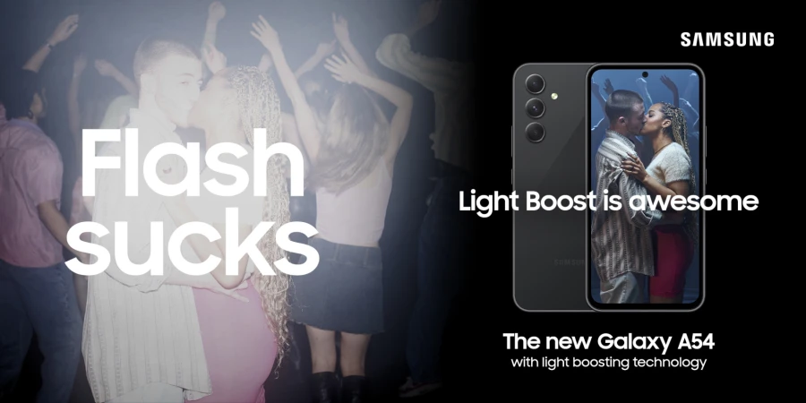 Samsung Galaxy A54 ad featuring a kissing couple at a party, contrasting with the phone's screen showing the same scene.