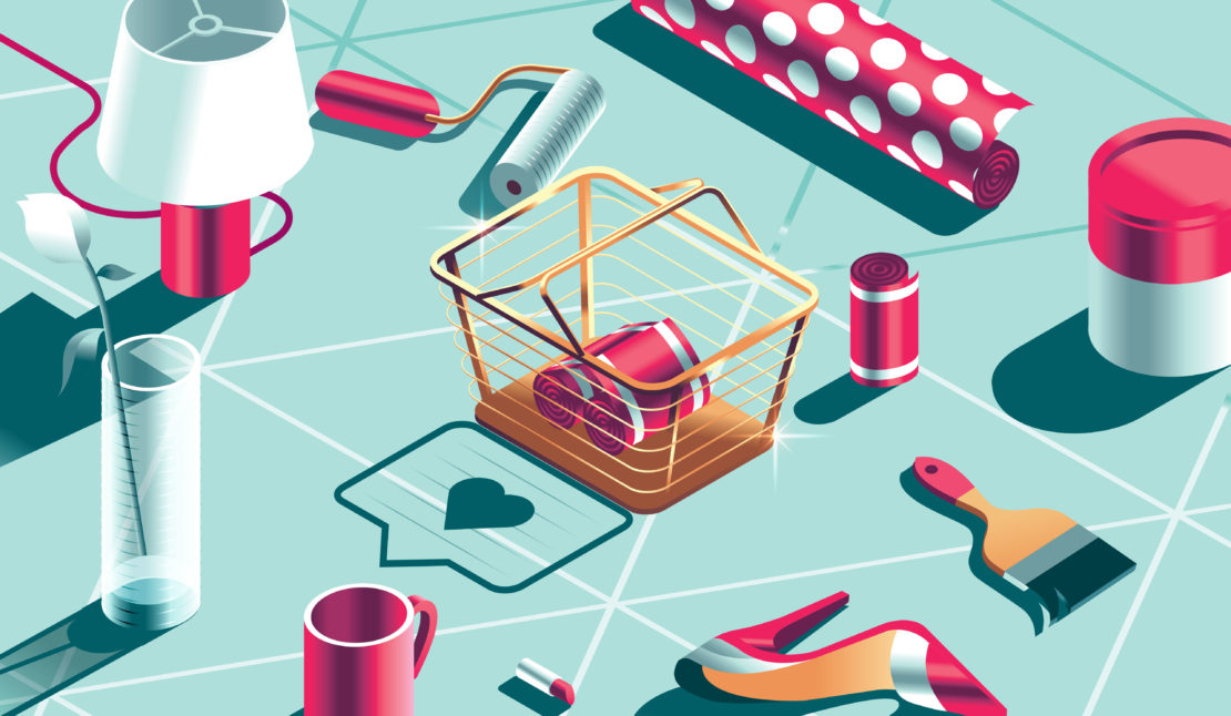Overhead shot of a shopping basket surrounded by home improvement and decorating supplies on a blue geometric patterned surface.