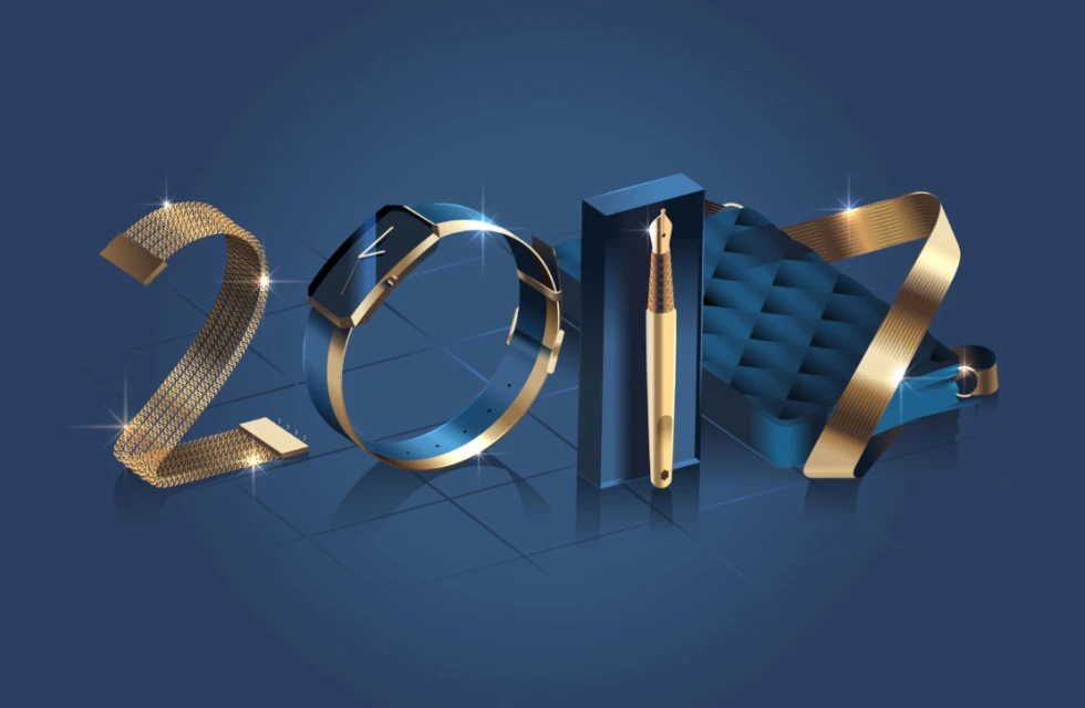 Stylish flat lay composition of gold watch, fountain pen, and textured clutch forming the number 2024 on a blue gradient background.