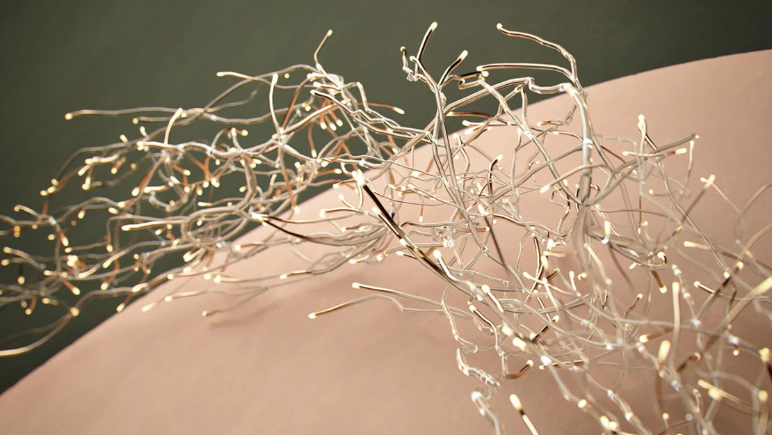 Abstract strands with luminous tips against a muted backdrop, creating a sense of depth and ethereal glow.