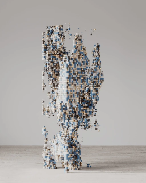 Abstract geometric sculpture formed from numerous blue and beige cubes, creating an irregular vertical column in a neutral setting.