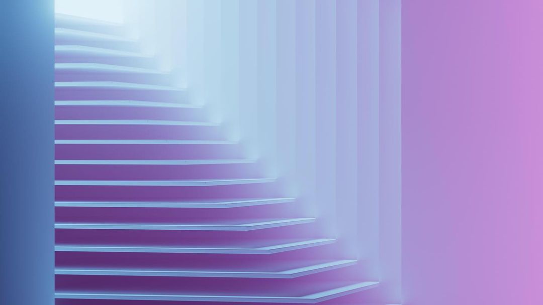 Abstract background with layered geometric shapes in shades of purple and blue, creating depth and a modern, minimalist aesthetic.