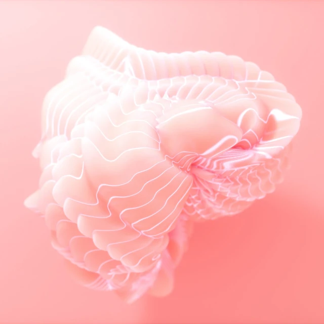 Close-up of a decorative light pink abstract object with ridged texture against a light pink background. Soft, diffused lighting.