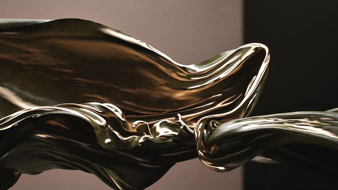 Abstract flowing fabric in golden hues with dramatic folds and elegant curves, set against a dual-tone background for artistic visual.