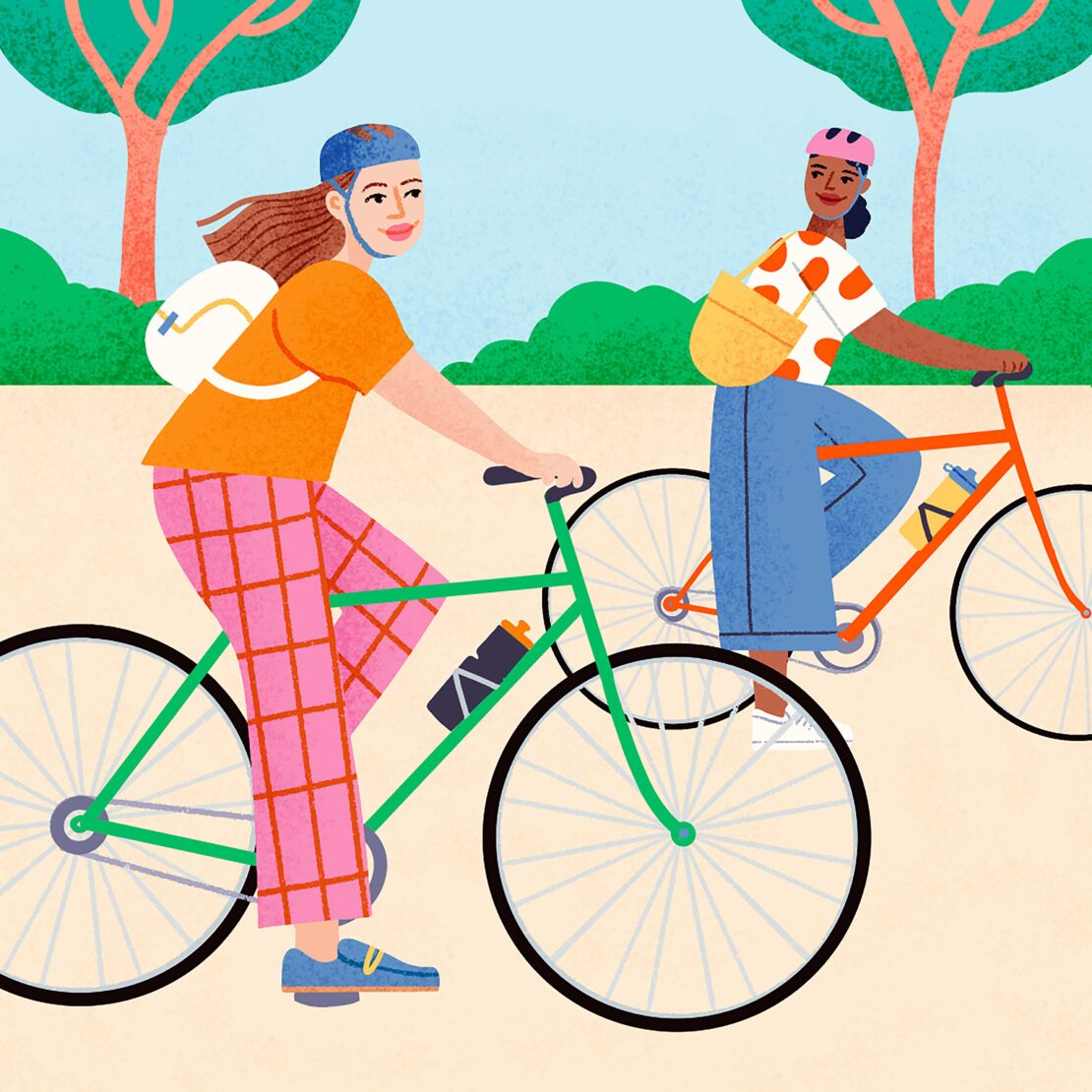 Two women ride bicycles along a path; illustration with pink and orange clothing, helmets, trees and blue sky. Sunny day illustration.