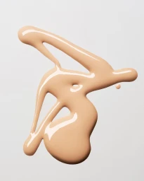 Glossy nude liquid foundation smear with fluid organic shapes on a clean white background
