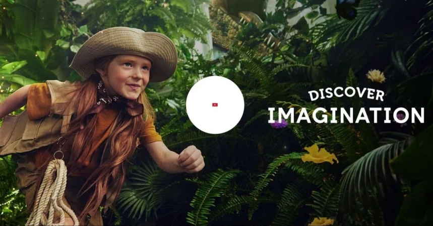 Young girl explorer in safari outfit with jungle foliage background. Adventure concept for kids and family, travel, nature, and wildlife.