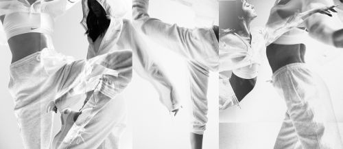 Multiple exposures show a woman in motion wearing a sports bra, hoodie, and sweatpants in a photo studio on a white background.