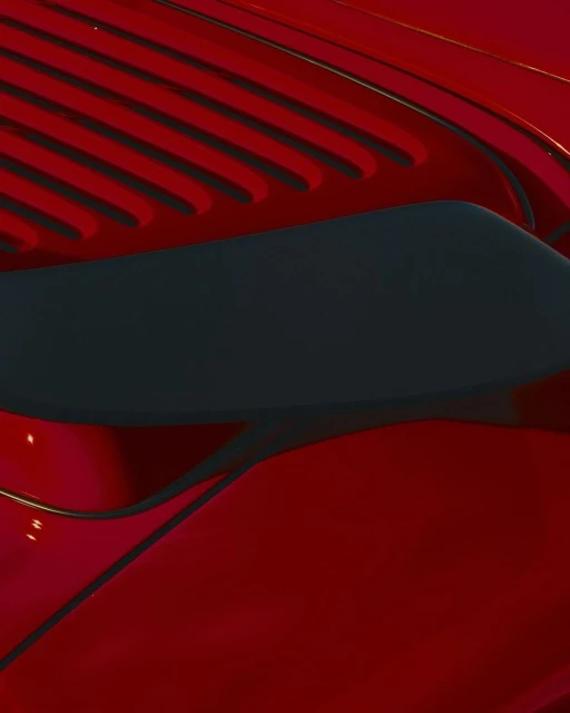 Close-up shot of a red automotive exterior featuring a dark gray vent, showcasing sleek lines and glossy finish in natural lighting.