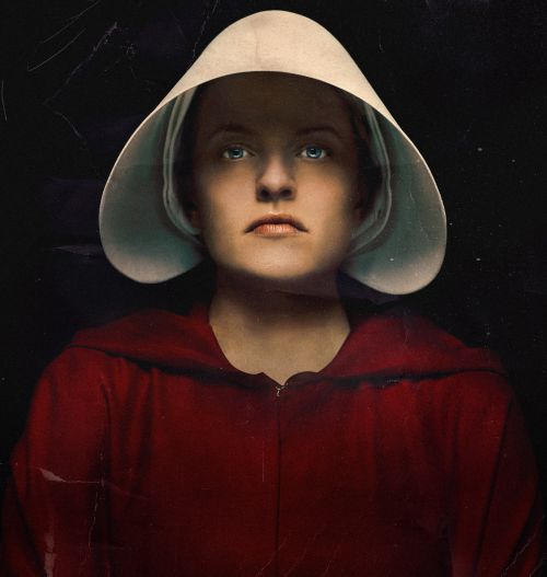Portrait of a woman wearing a white bonnet and red hooded robe, evoking a somber and contemplative mood in a dark setting.