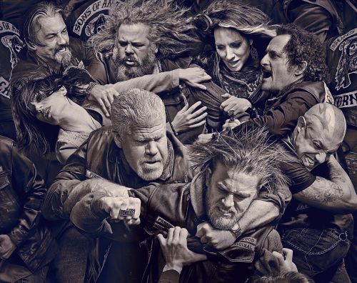 A densely packed, monochrome image of the cast of Sons of Anarchy, their faces intense and expressions ranging from fierce to distressed.